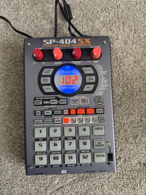 Roland SP-404SX Sampler Built-In Effects, Battery Powered, SD Slot, 12 Pads