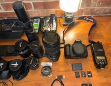 canon eos 60d camera with lenses, carrying case, tripod, and other accessories