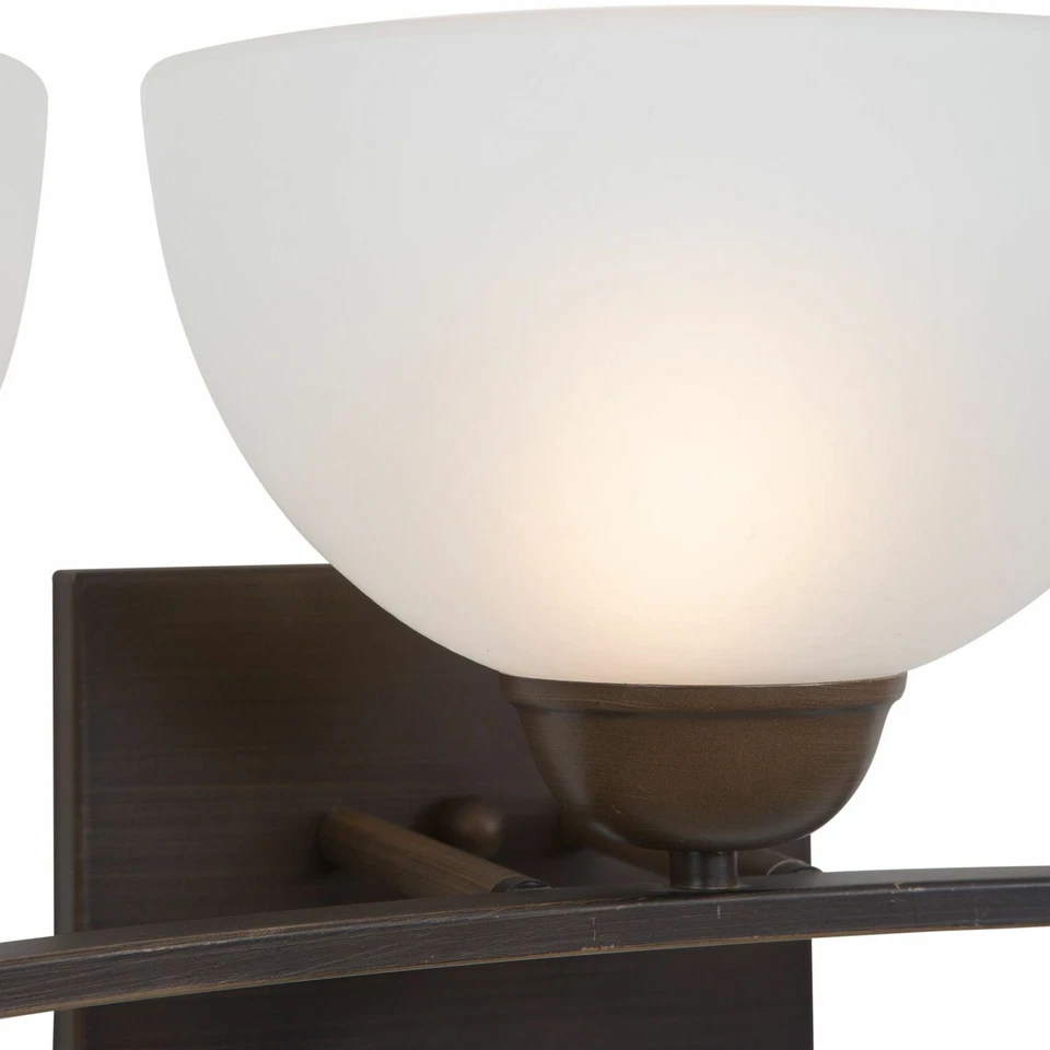 Luz de tocador de baño Columbia Rock de bronce frotado con aceite de 3 luces con pantalla blanca Foto 2 de 2