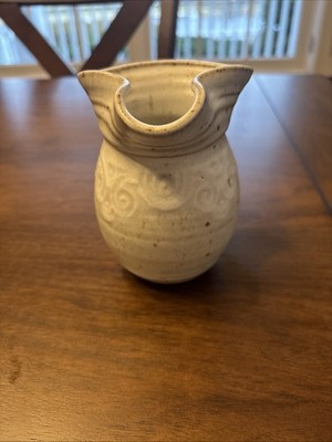 Petite Earth Colored Pottery Vase With Interesting Rim And Swirly Design