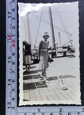 Woman Playing ShuffleBoard Cruise Ship Upper Deck Games Photo Snapshot Weights