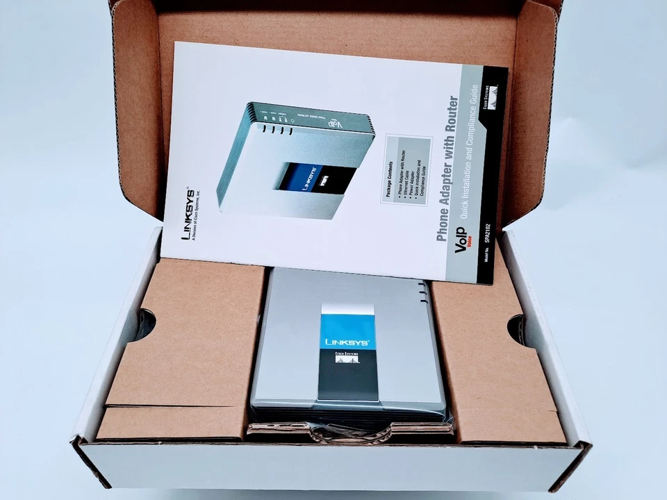 Lote de 2 adaptadores de teléfono VoIP Linksys SPA2102 con router Foto 2 de 3