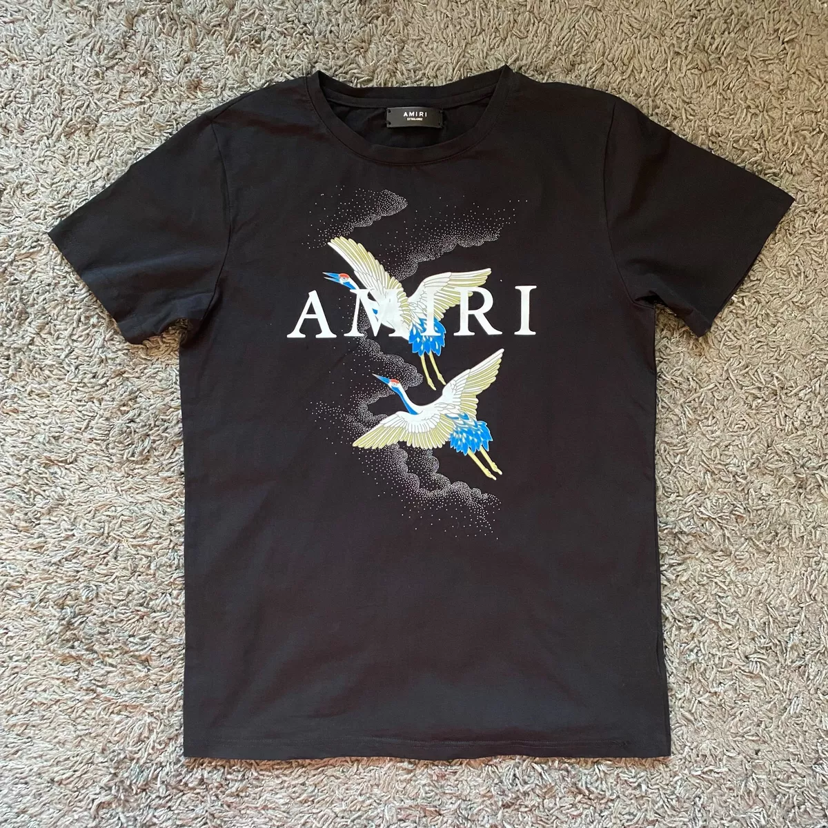 Men's shirt deals size to women's