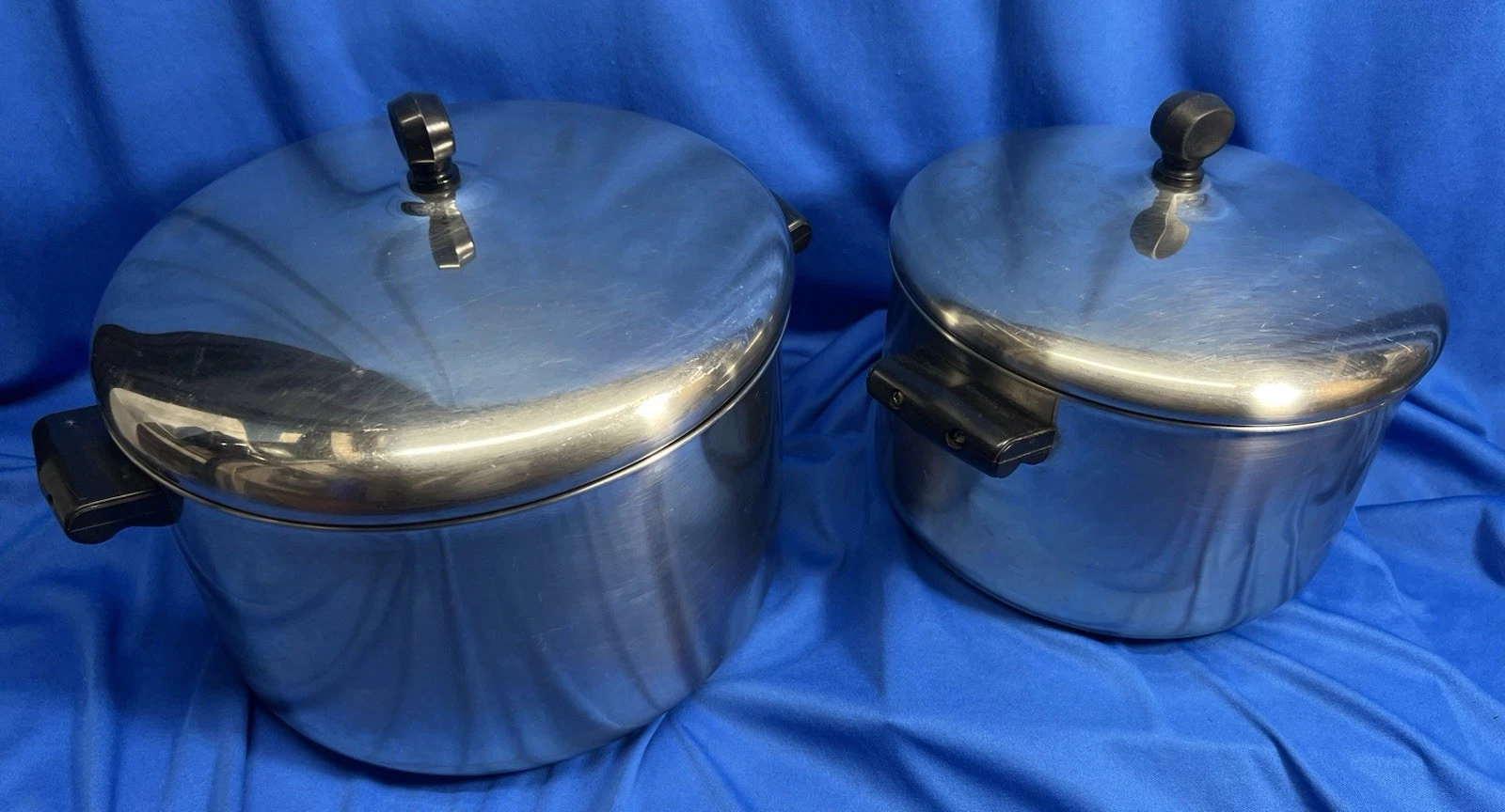 2 EUC Farberware stainless steel/aluminum clad stockpots w/lids, 8qt, 4qt.