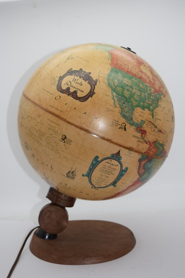 A 1980s Reader's Digest 'Spot Scan' illuminated globe from Denmark — press a button to light up countries, a novelty that's equal parts vintage tech and geography lesson.