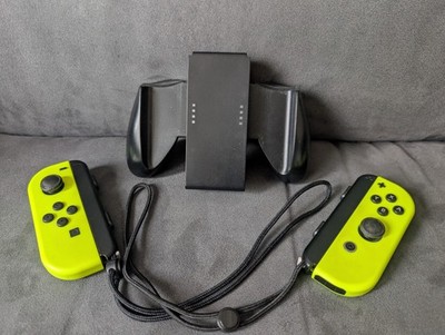 Nintendo Switch Joy-Con 2er-Set Neon Original + Pad Halterung