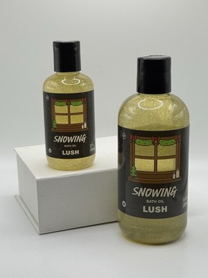 LUSH Cosmetics Bath Oil Snowing 8.4fl oz PLUS 3.3fl oz NEW Glitter