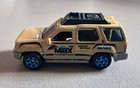 Matchbox Nissan XTerra Beige MBX Marine Park Habitat Support Die Cast Car 1:64