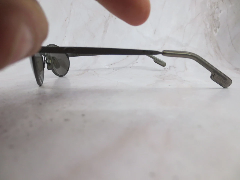 Gafas de sol Foster Grant Ironman para triatlón marco TL1-214 Gunmetal borde completo ovalado Foto 3 de 4