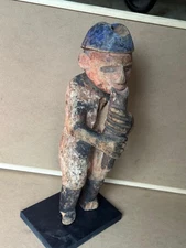Antique Urhobo Male Figure Playing a Flute - Nigeria, Niger Delta