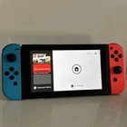 NINTENDO SWITCH V2 handheld console with Neon Blue Neon Red Joycons Near Mint
