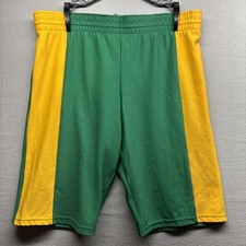 Vintage Men s Extra Large Rawlings Shorts Green And Gold 91 Nylon 9 Spandex