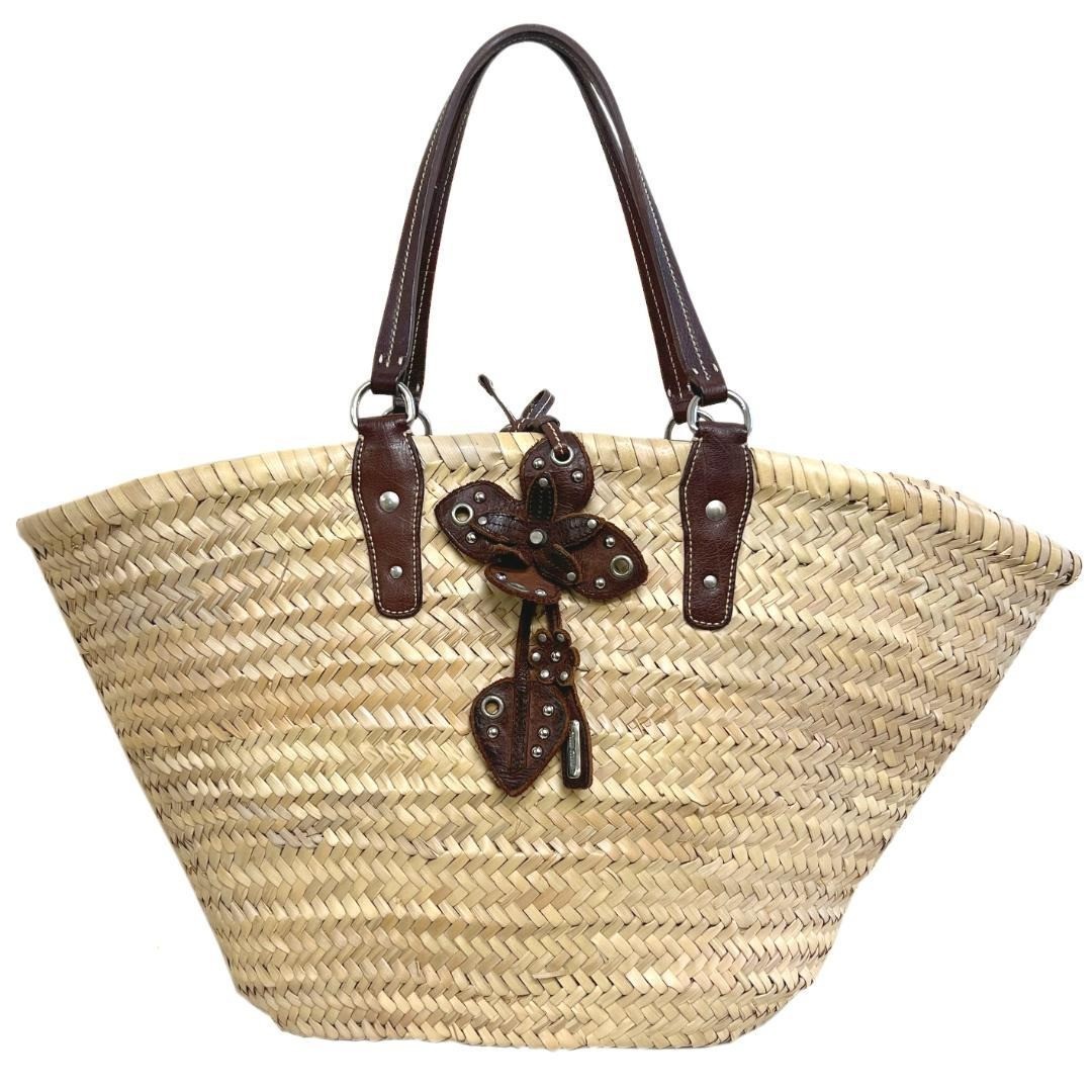 Miu Miu Straw Tote Bag with Brown Leather Handles and Floral Charm for Summer