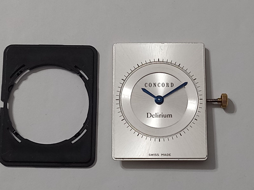 CONCORD DELIRIUM 25.5 X 19.5 MM SILVER DIAL WITH QUARTZ MOVEMENT -MINT CONDITION - Picture 2 of 9