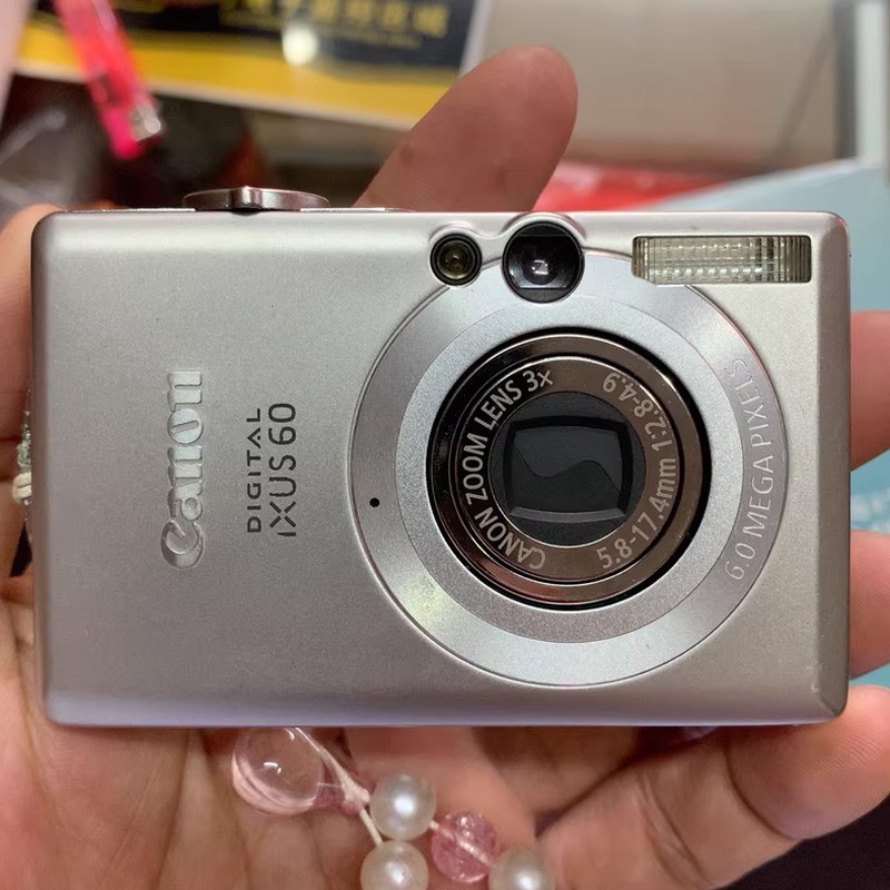 Canon IXUS 60 6.0MP 3X Optical Zoom CCD Digital Camera Silver - 90
