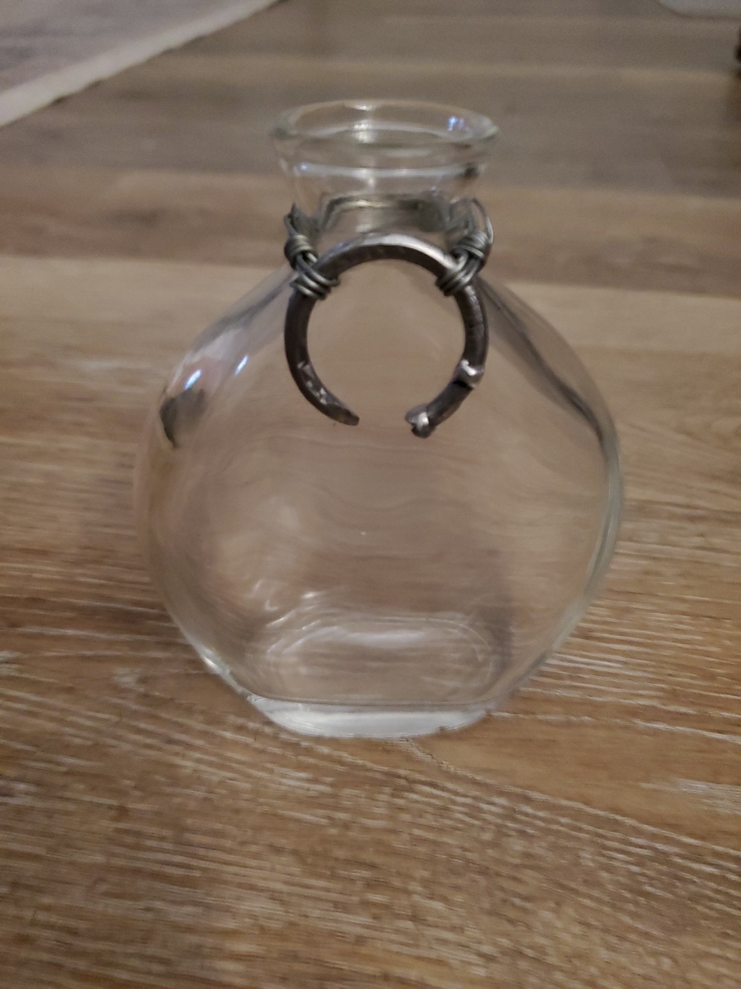 Unique clear glass bottle with pewter collar