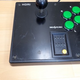 Sega Saturn console with Virtua Gun, Hori Fighting Stick, 2 controllers &3 Games