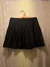 black pleated skirt