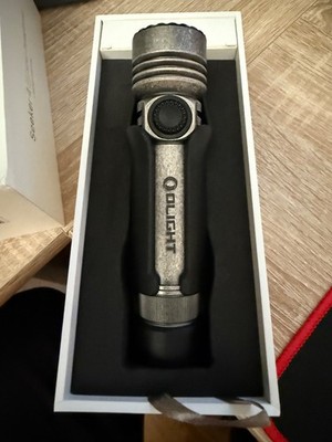 Olight Seeker 4 Pro Silver-Plated Bronze Limited Edition