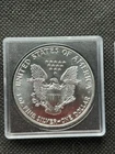 1987 SILVER EAGLE DOLLAR BULLION COIN IN UNCIRCULATED CONDITION (FOUR AVAILABLE)