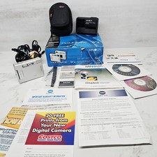 MINOLTA DIMAGE Xt Digital Camera w/ charger, 3 batteries, Box  Accessories