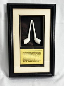 2 Knockcroghery traditional Clay Pipes known as Duidins in a Framed Shadow Box