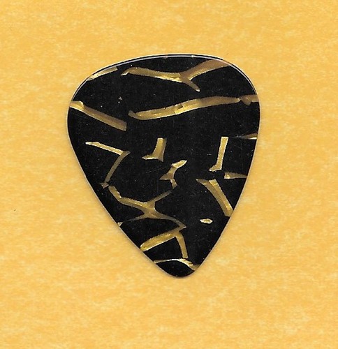 black with gold colored design guitar pick standard shape medium gauge