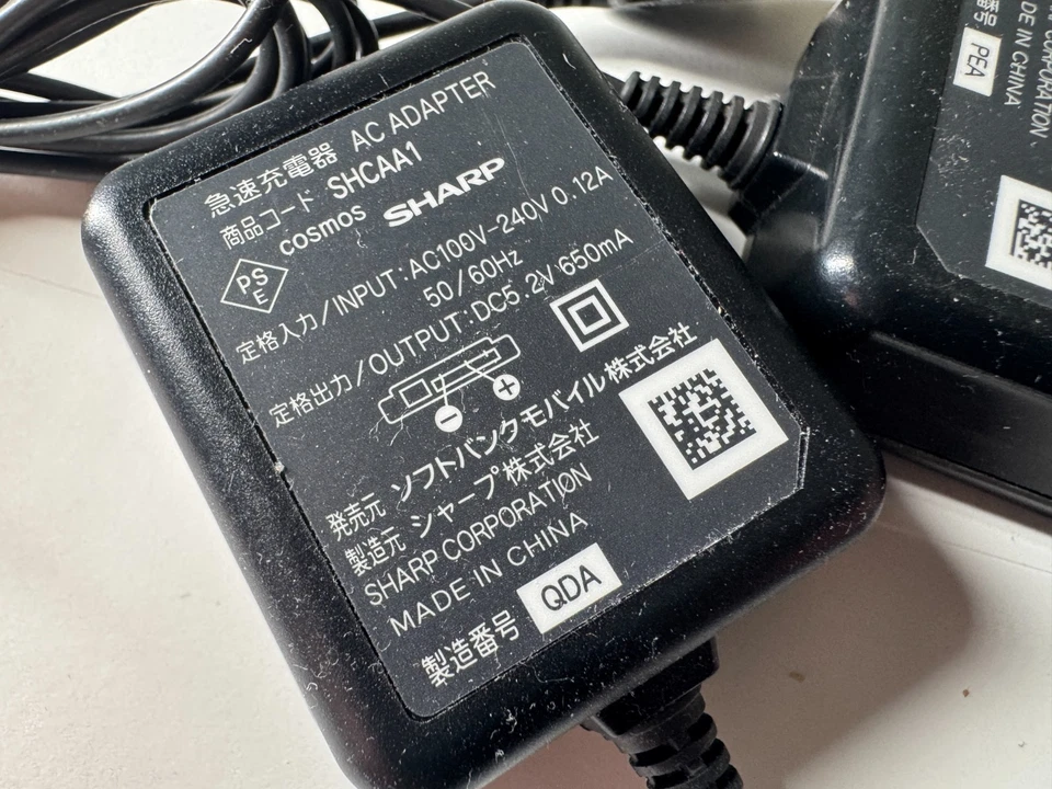 Cargador genuino Sharp / Fujitsu / SoftBank / Docomo / SH-06 SH-01 F-06D Foto 2 de 2