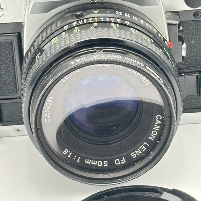 Canon AE-1 program Film Camera With 50mm Canon Lens Strap and Film