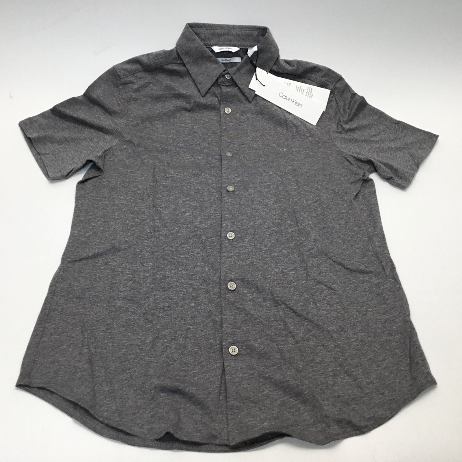 Мужская рубашка Calvin Klein серого цвета из 100 хлопка с коротким рукавом на пуговицах XS 9390₽