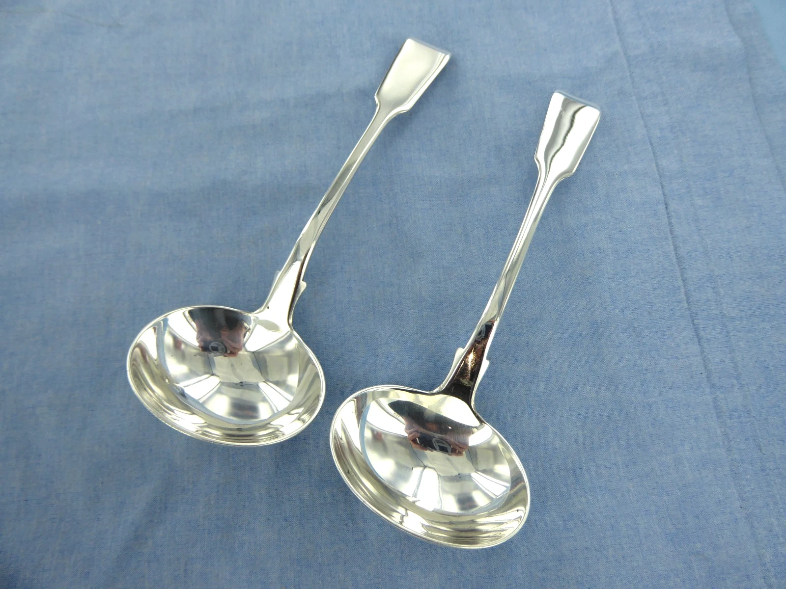 AN ANTIQUE PAIR OF STERLING SILVER FIDDLE BACK SAUCE LADLES LONDON 1839.
Opens in a new window or ta