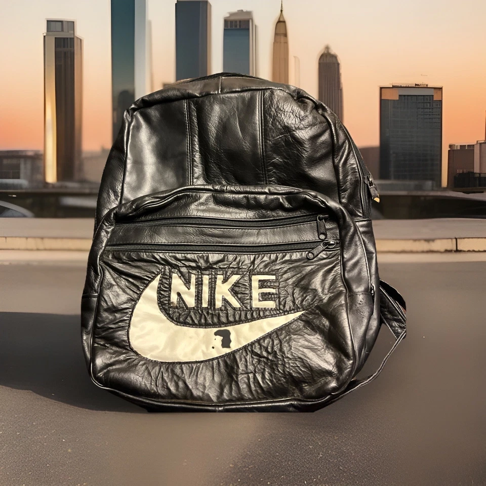 Mochila Nike vintage de cuero genuino de los años 80/90 negra con Swoosh blanco * cremallera rota Foto 2 de 4