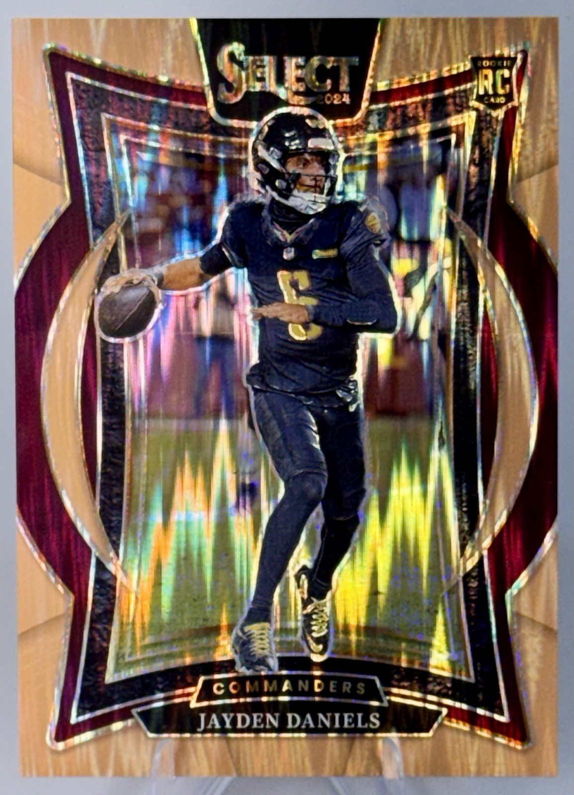 2024 Panini Select Jayden Daniels #26 Concourse Copper Shock Prizm (RC) 66/299