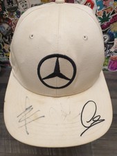 Mercedes AMG F1 Lewis Hamilton Cap Signed by Nic Hamilton and Another Driver Hat