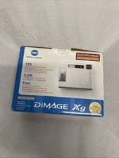 Konica Minolta Dimage XG with Charger Battery SD Card in Box Tested Working