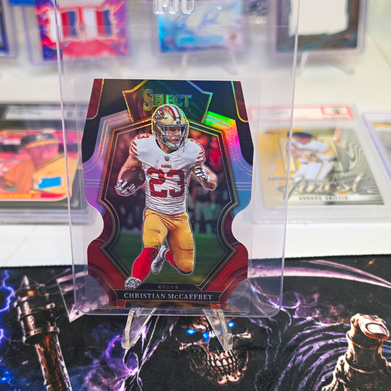 2022 Panini Select Premier Level Christian McCaffrey 49ers Black/Red Prizm #186