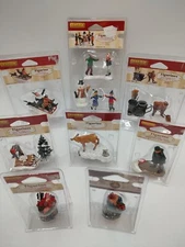 Lemax Christmas Village Figurine Lot of 12 figures 2005 New Snow Sledding People