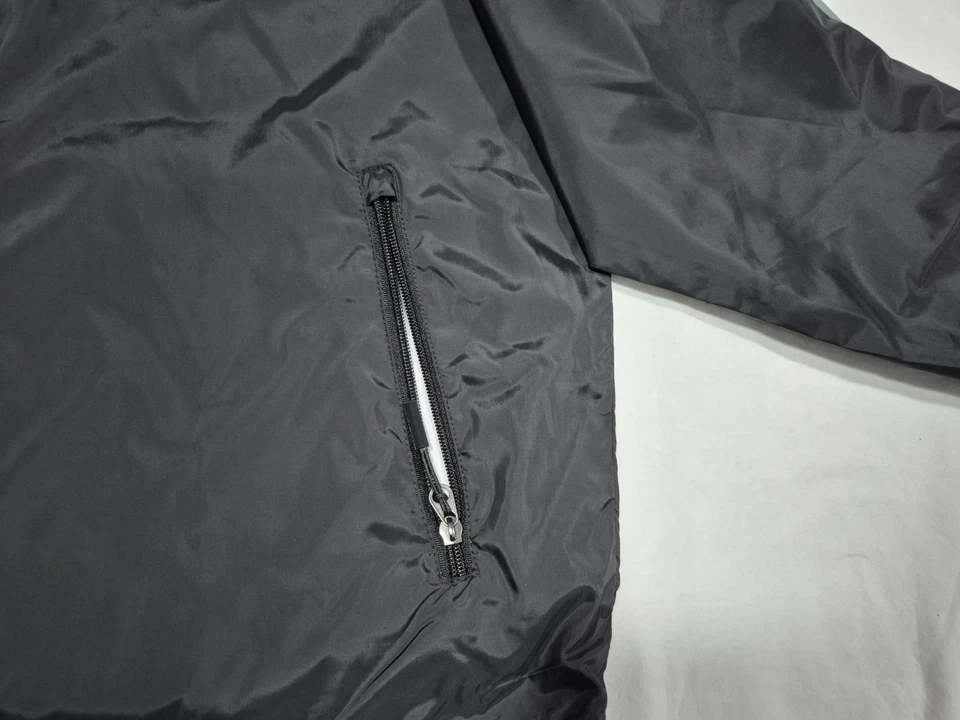 Chaqueta cortavientos New Balance para hombre totalmente forrada ligera con capucha talla grande Foto 3 de 4