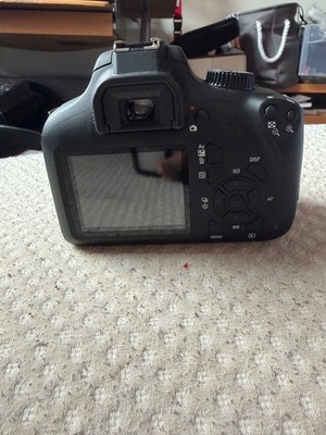 Canon EOS Rebel T100 DSLR Camera with EF-S 18-55mm f/3.5-5.6 Lens
