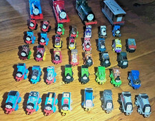 Thomas And Friends Mini Rail Cars With 4 Larger Trains