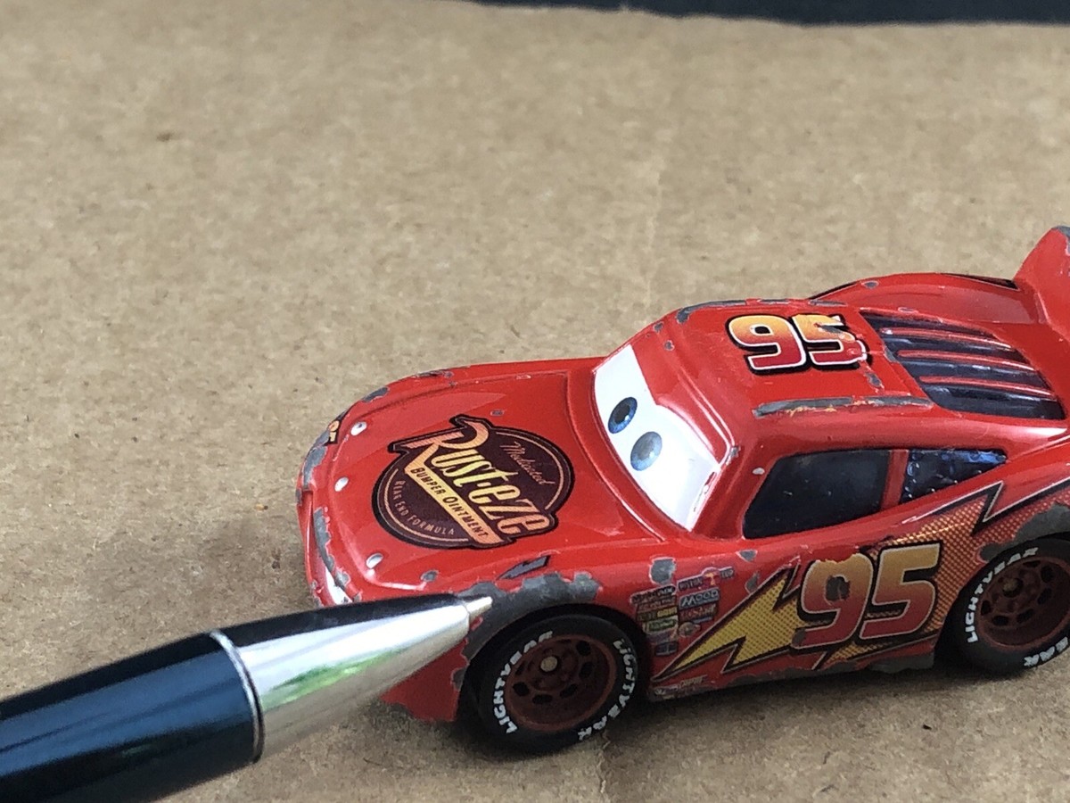 Disney Pixar Cars Lightning McQueen #95 Rust-Eze 1/64, COMB