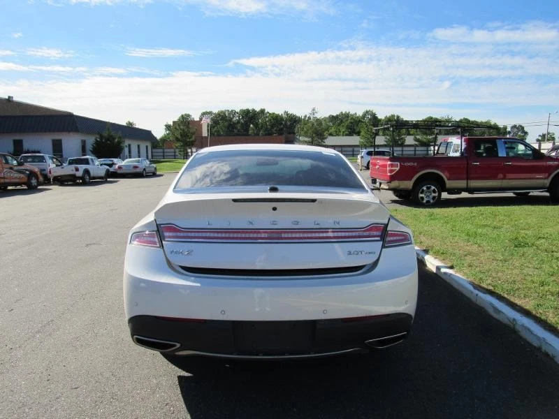 SILENCIADOR 17 18 19 20 SOLO CAMIONETA LINCOLN MKZ Foto 3 de 4