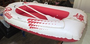 Vintage Miss Rainier beer rubber raft.