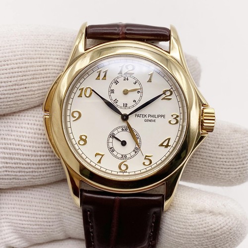Patek Philippe Calatrava Voyage Temps 37mm or Jaune Blanc Cadran Montre 5134J - Photo 2 sur 12