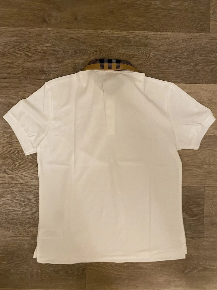 Camisa polo de algodón con cuello a cuadros Burberry negra talla L Foto 2 de 2