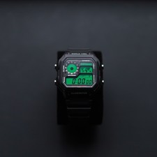Image of Black CASIO AE1200 Watch - Custom Green Filter. Brand New with Box and Papers