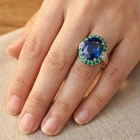 Luxurious Vivid Blue Sapphire 9.60Ct 925 Sterling Silver White Gold Halo Rings