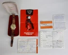 VINTAGE TIMEX ELECTRONIC WATCH (HIDDEN CROWN) WITH BOX AND PAPERS PURCHASED 1962