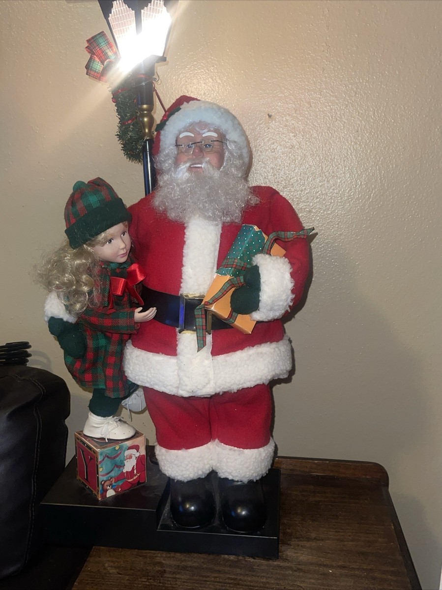 Holiday scene Animated Santa w/ Girl Lighted Lamp Post Christmas