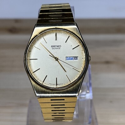 時計 SEIKO Universe DIASHOCK 14KWG 180200 1980's Seiko Gold Tone Men's Quartz Watch W/ Day/Date 6533-8000